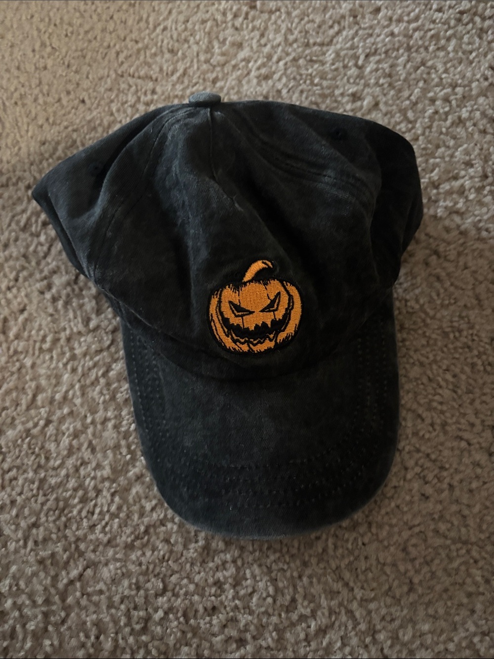 Spirit Halloween Black Baseball Cap with Orange Jack-o'-Lantern Patch
